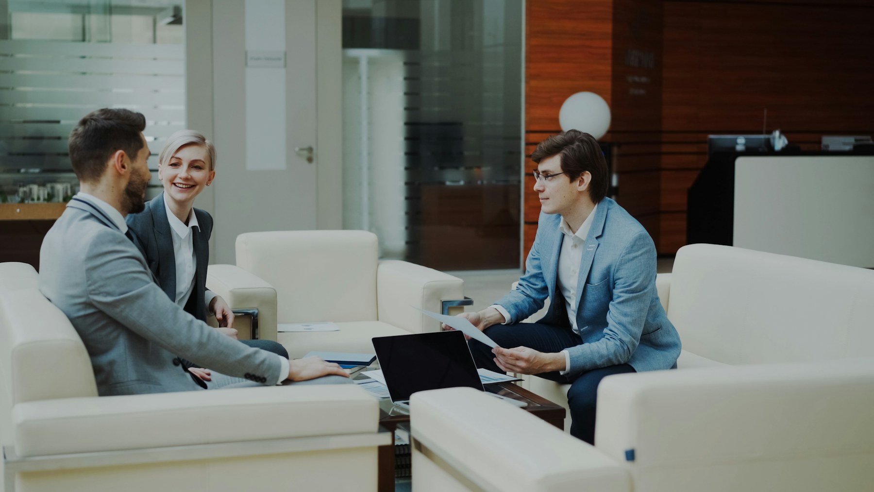 Business professionals discussing plans together