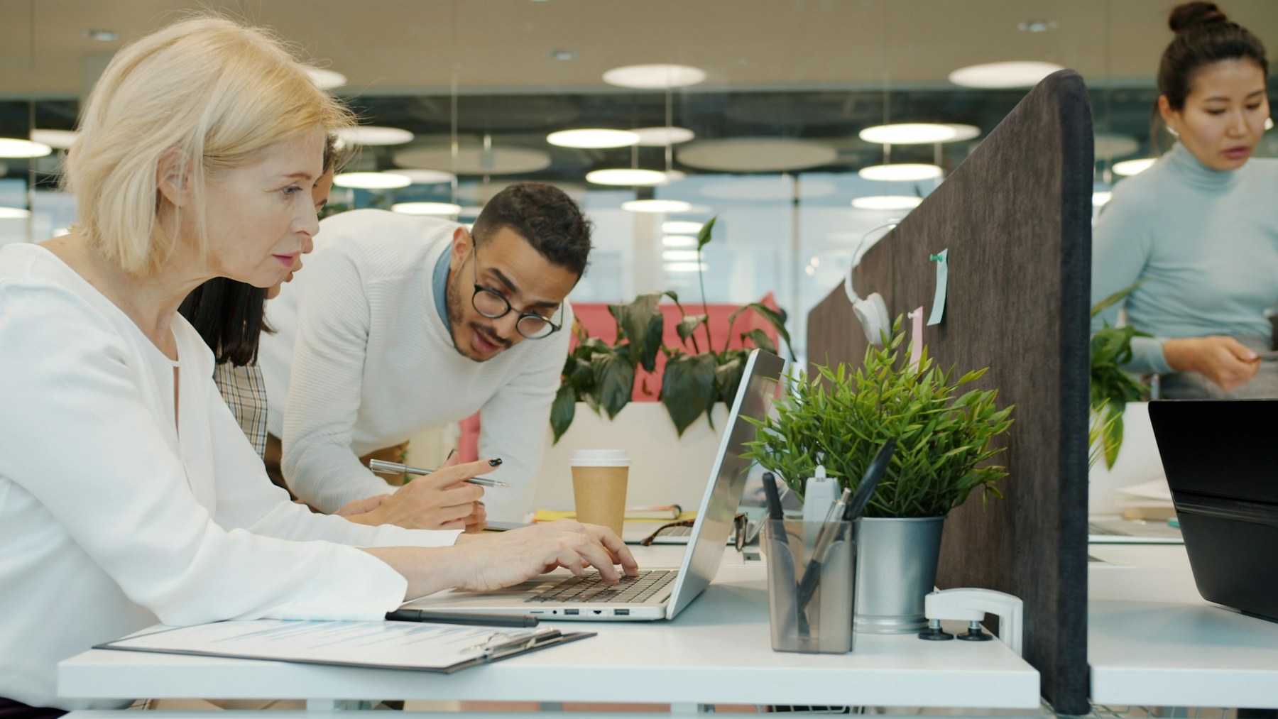 Professionals collaborating together at work